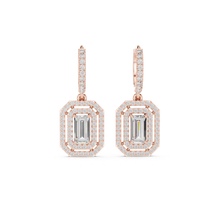 Load image into Gallery viewer, Rose gold earrings with emerald-cut moissanite gemstones on a white background