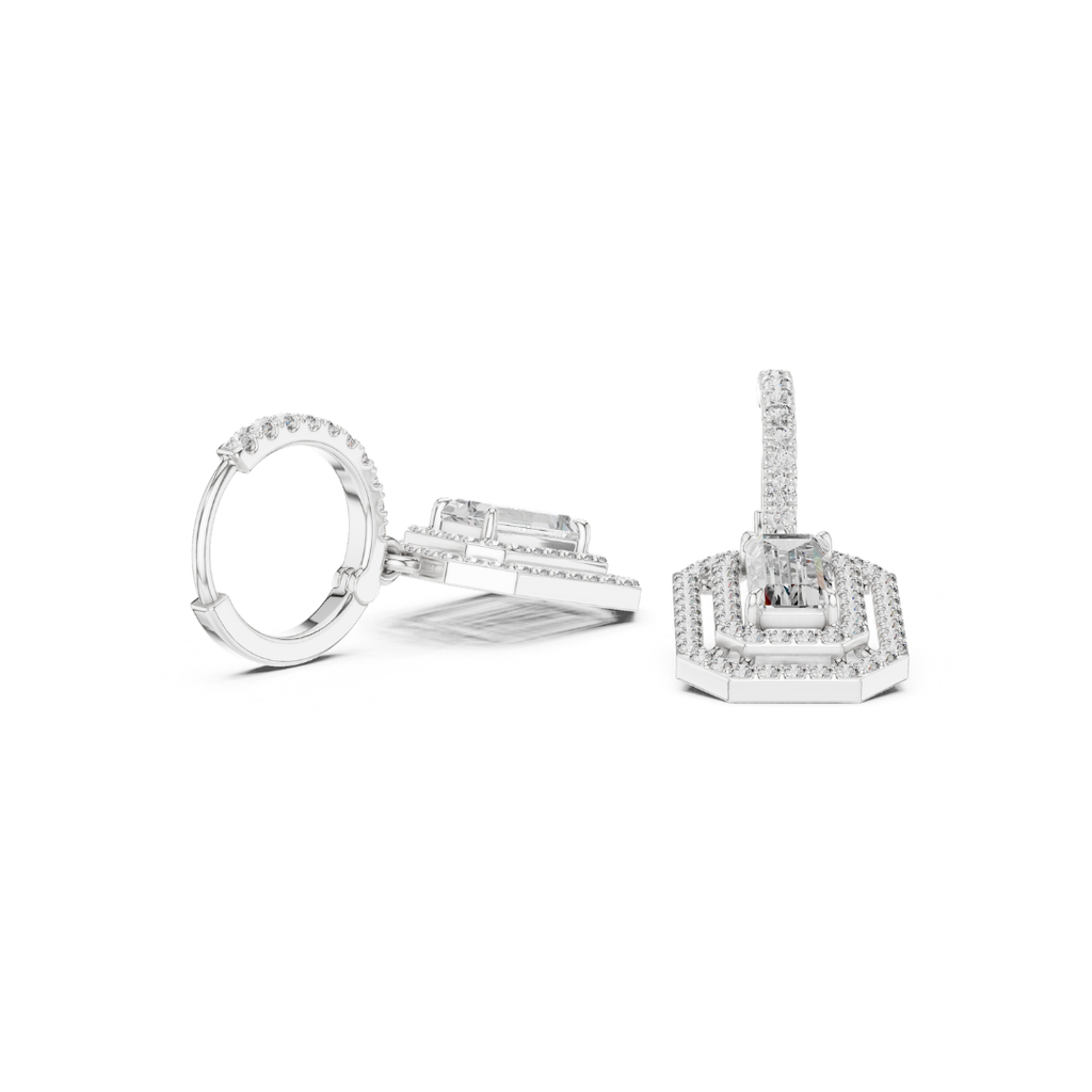 Set of moissanite  diamond earrings on a white background