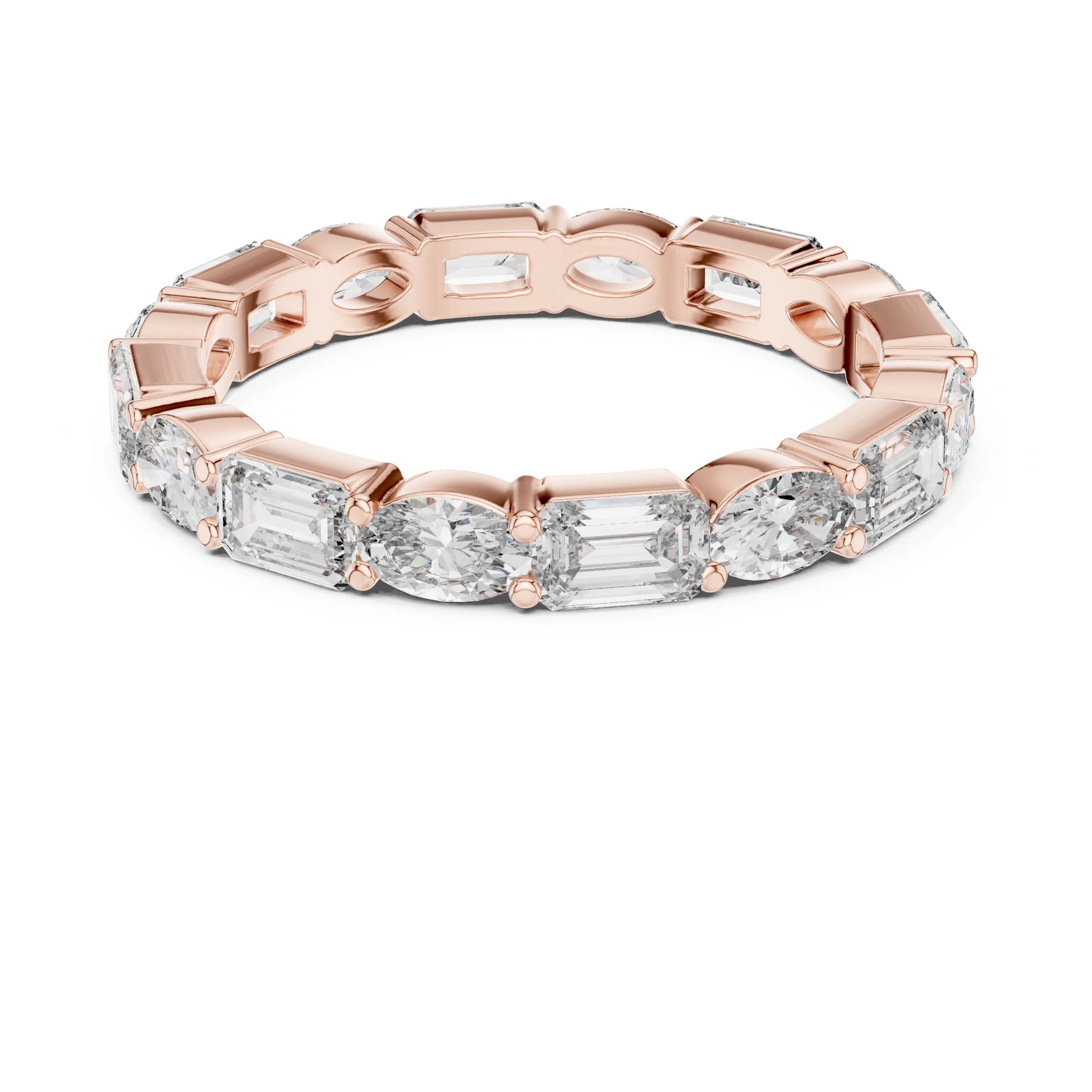 Rose gold ring with emerald-cut moissanite diamonds on a white background