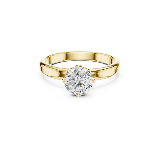 Gold ring with a 1ct moissanite diamond on a white background