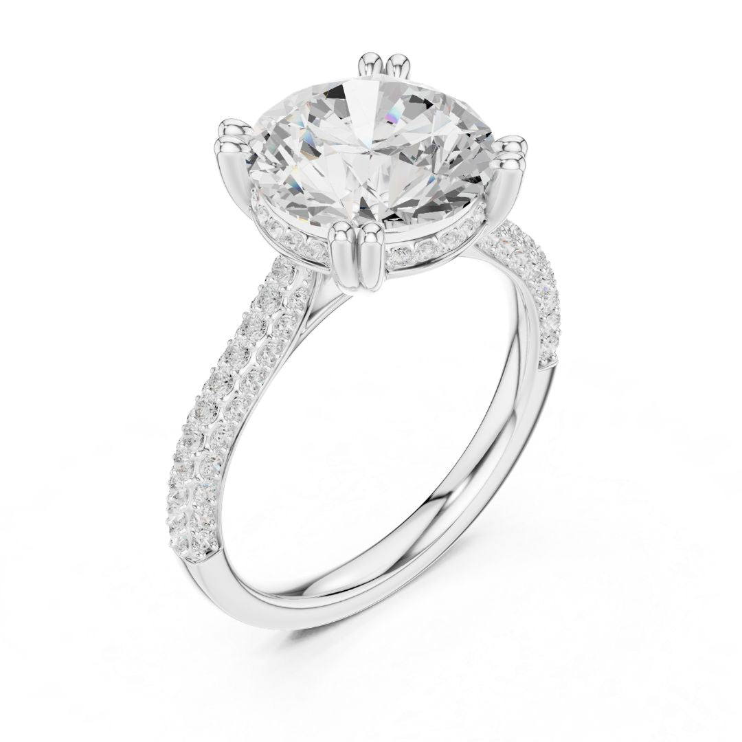 moissanite Diamond ring with a large central gemstone and smaller stones on the band against a white background