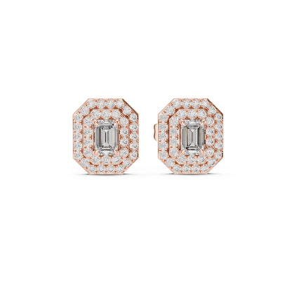 Gold hoop earrings with moissanite stones on a white background
