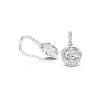 Pair of moissanite diamond earrings on a white background