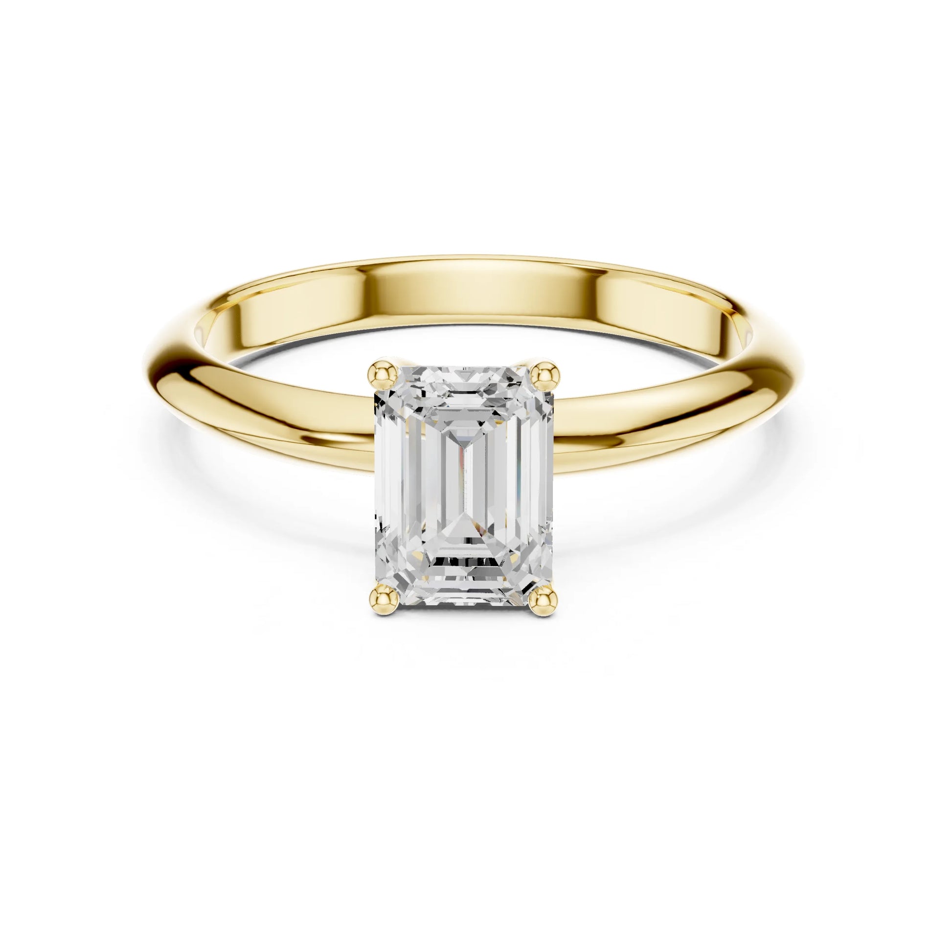 Gold ring with a rectangular moissanite diamond on a white background