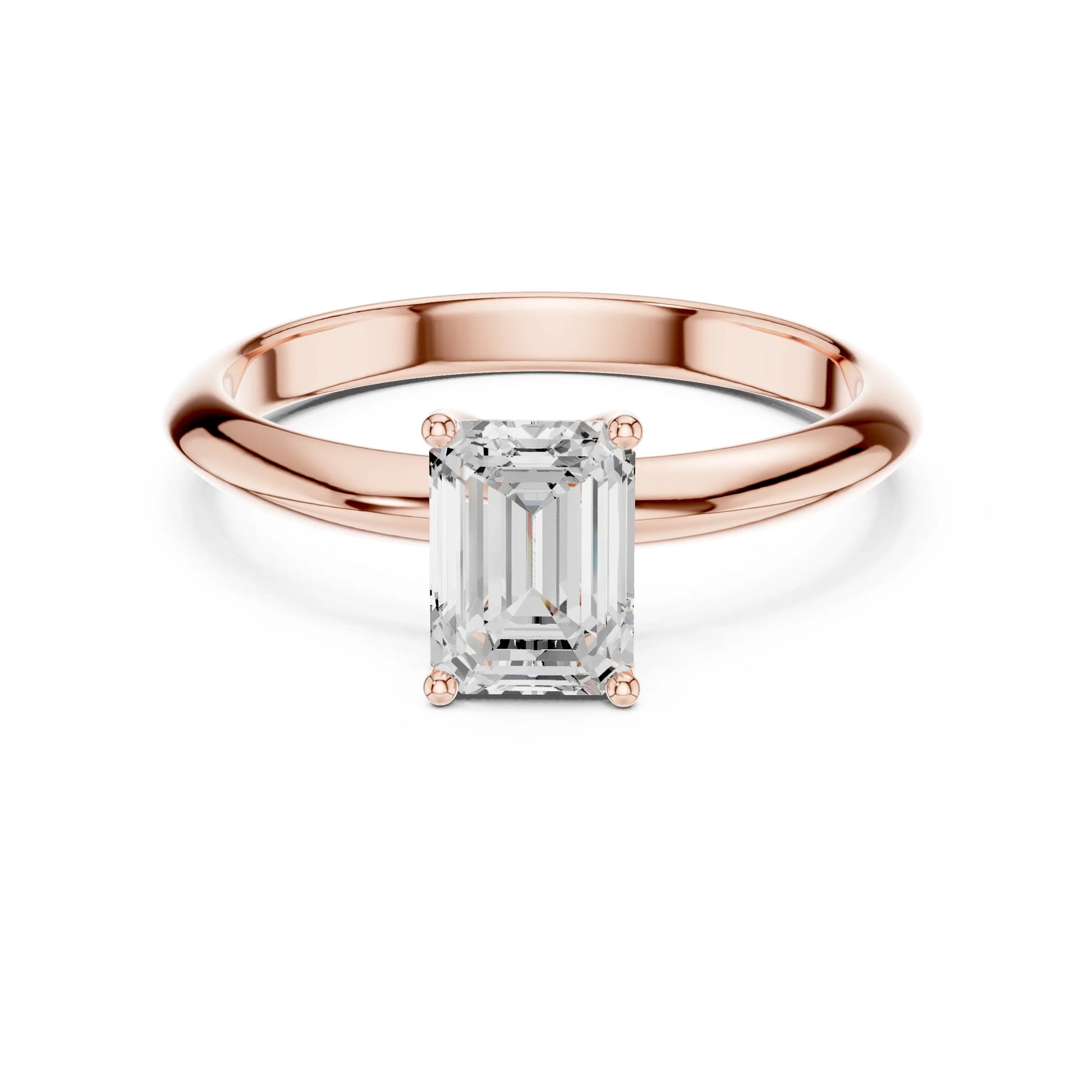Rose gold ring with a rectangular moissanite diamond on a white background