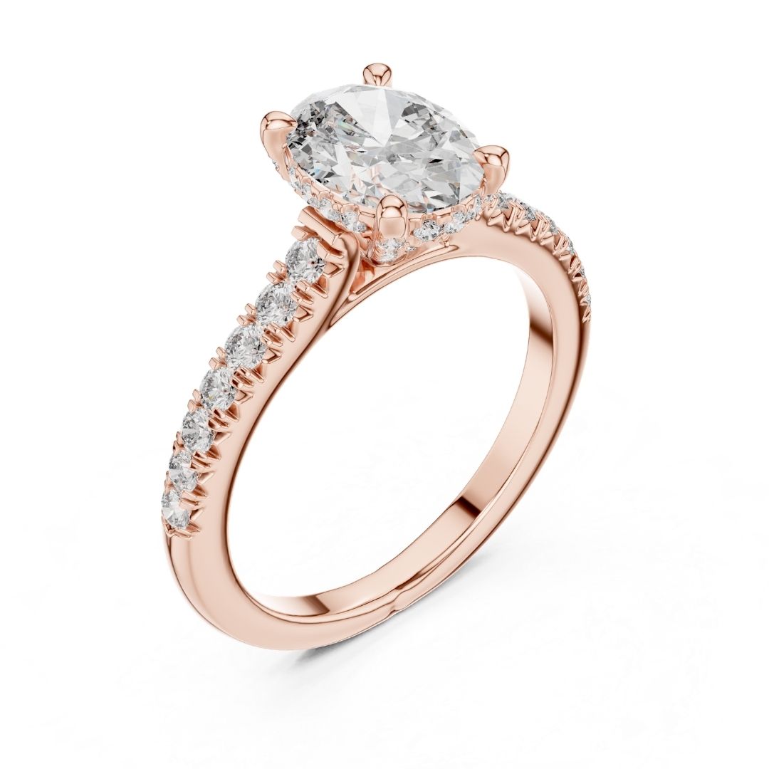 Rose gold ring with a large missanite diamond and smaller diamonds on the band against a white background