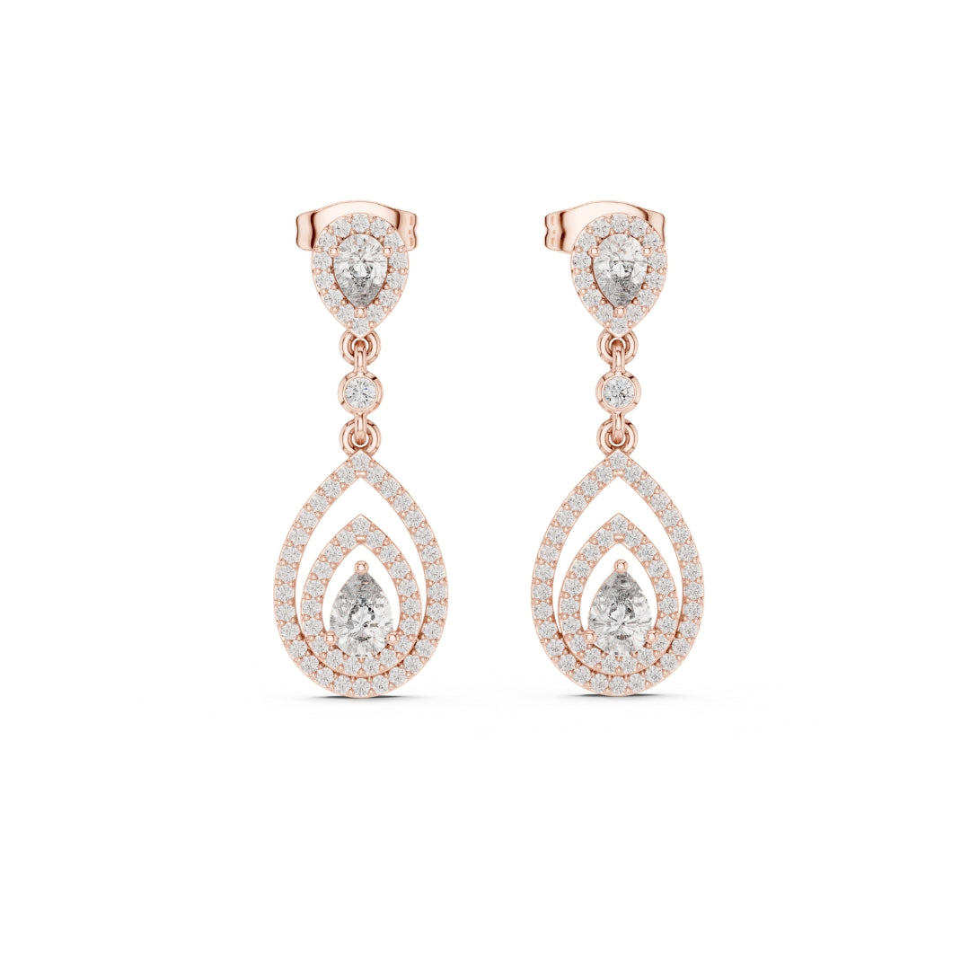 Rose gold teardrop earrings with moissanite clear gemstones on a white background