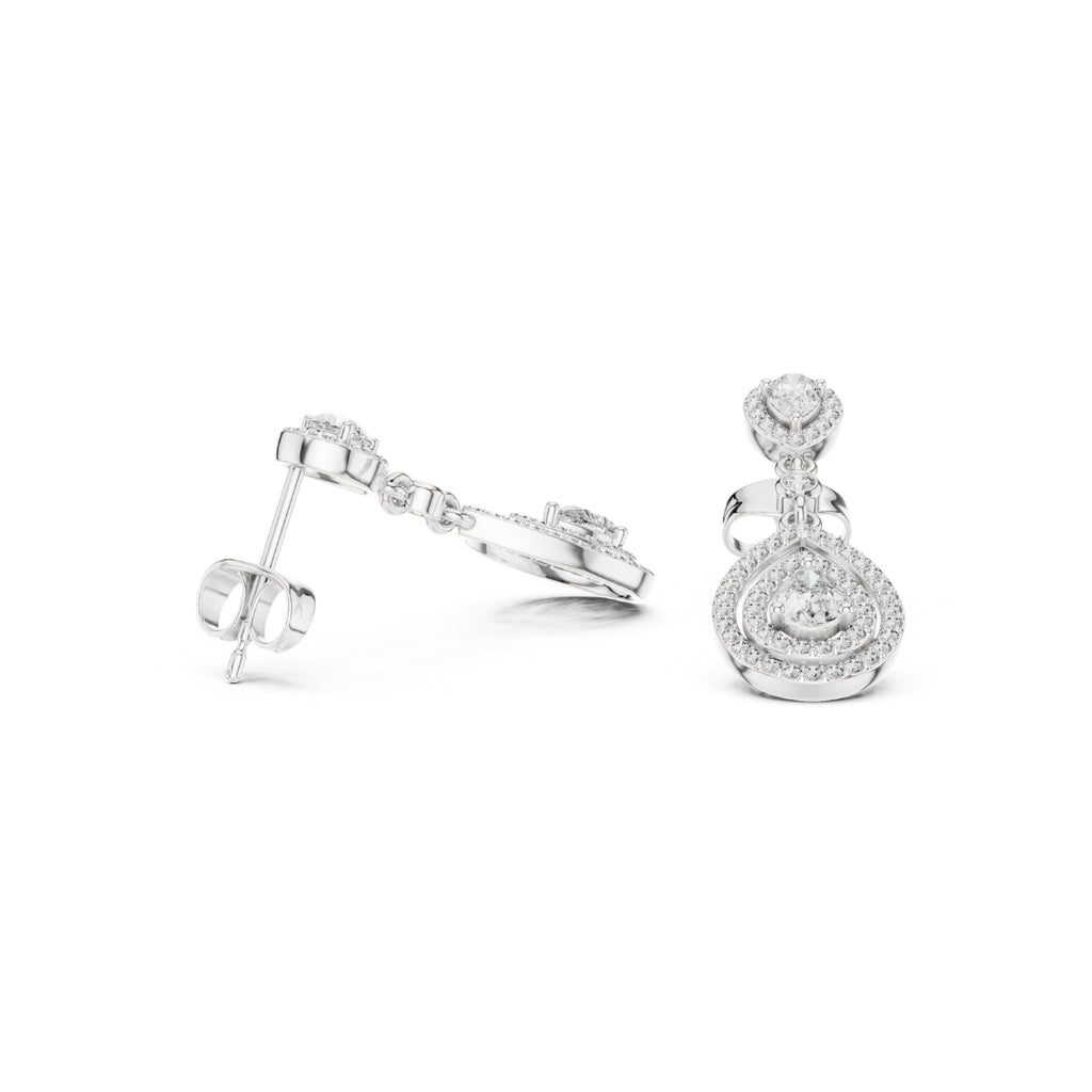 Pair of  moissanite silver earrings on a white background