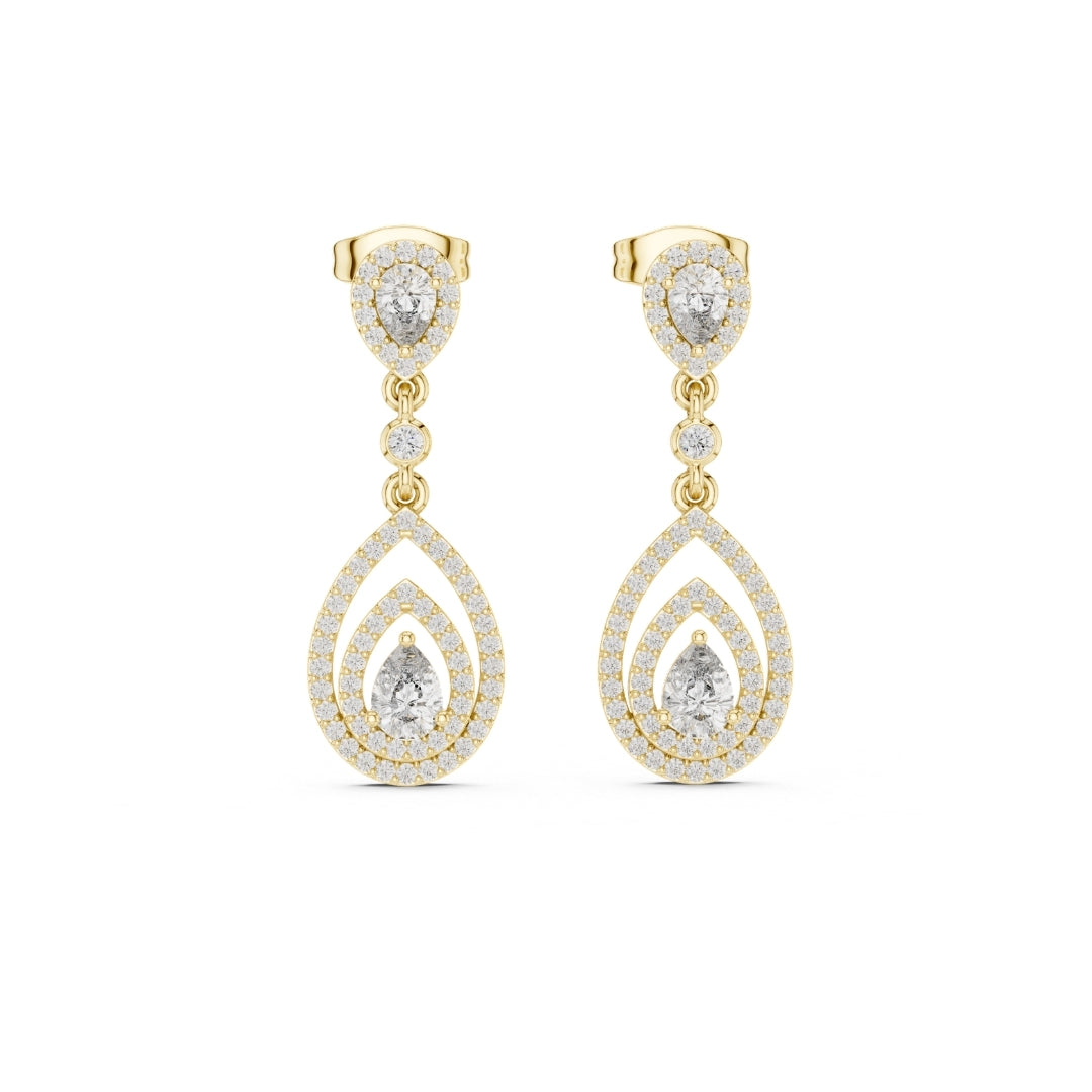 Gold and moissanite diamond teardrop earrings on a white background