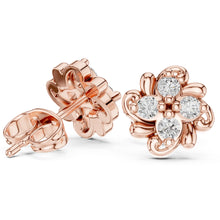 Load image into Gallery viewer, Rose gold earrings with Moissanite diamond accents on a white background