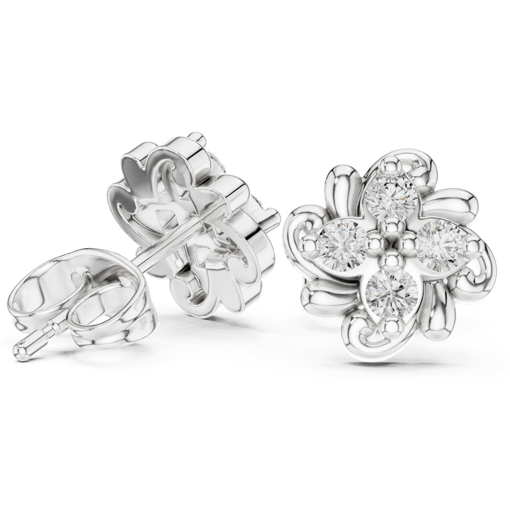 Silver flower-shaped earrings with clear moissanite gemstones on a white background