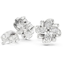 Load image into Gallery viewer, Silver flower-shaped earrings with clear moissanite gemstones on a white background