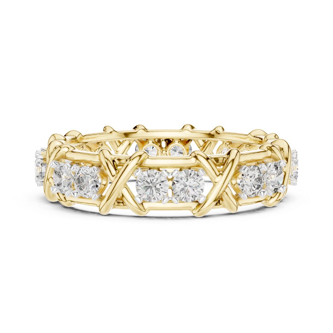 Gold ring with moissanite diamond accents on a white background