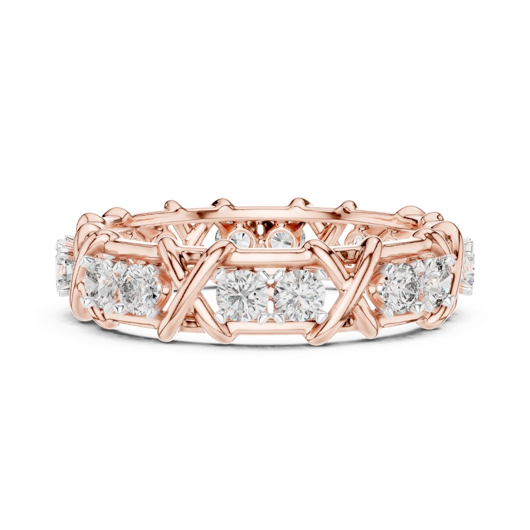 Rose gold ring with moissanite diamond accents on a white background