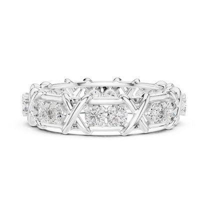 Silver ring with moissanite diamond accents on a white background