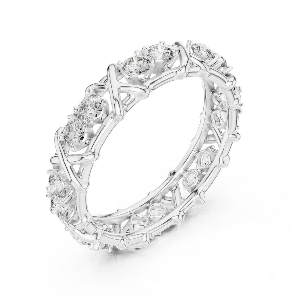 Silver ring with moissanite diamond accents on a white background