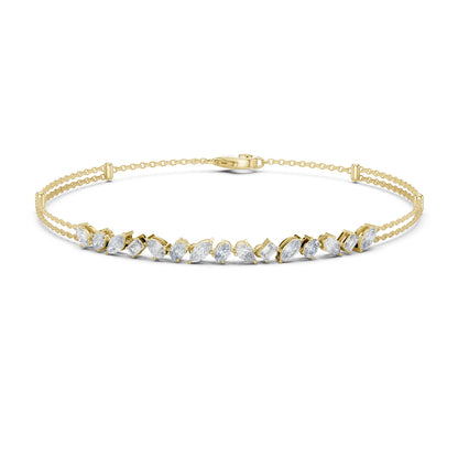 Gold bracelet with clear moissanite stones on a white background