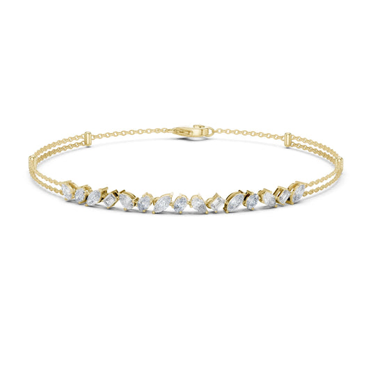Gold bracelet with clear moissanite stones on a white background