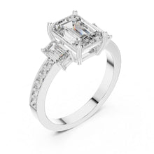Load image into Gallery viewer, Diamond ring with emerald-cut and baguette-cut moissanite diamonds on a white background