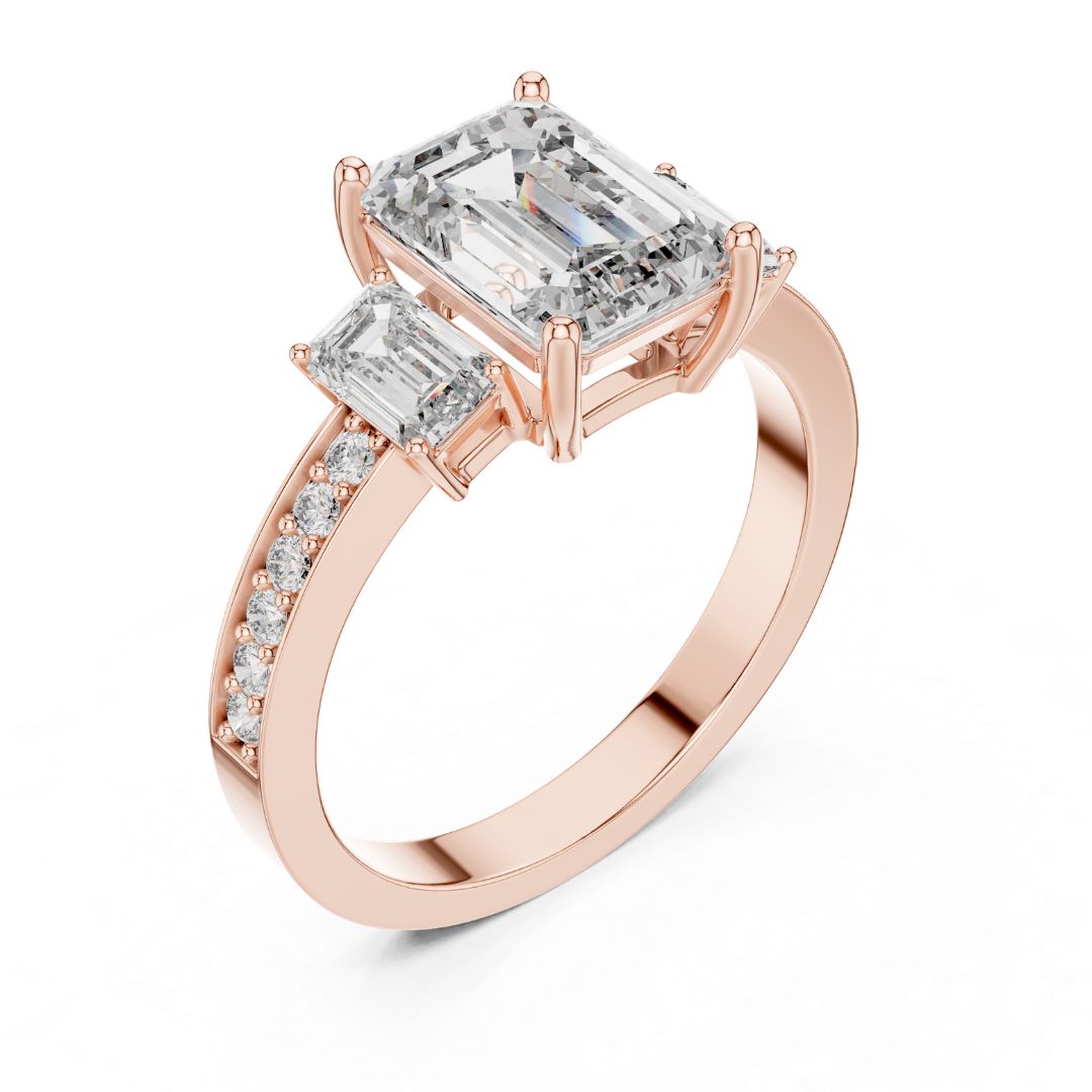 Rose gold ring with emerald-cut moissanite diamonds on a white background
