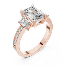 Load image into Gallery viewer, Rose gold ring with emerald-cut moissanite diamonds on a white background