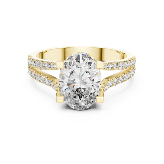 Gold ring with a large moissanite diamond and smaller diamonds on the band against a white background