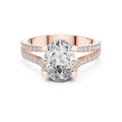 Rose gold ring with a large moissanite  diamond and smaller diamonds on the band against a white background