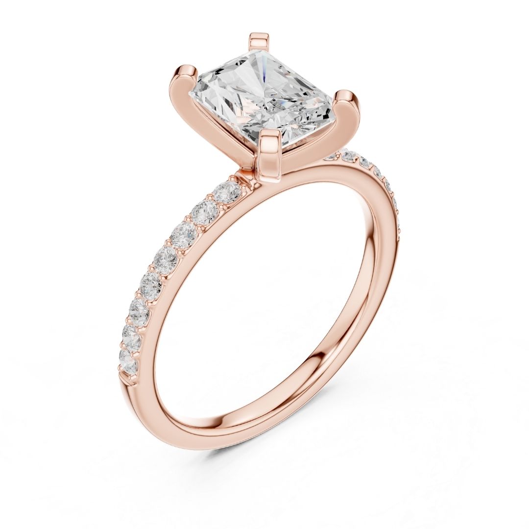 Rose gold ring with a moissanite diamond on a white background