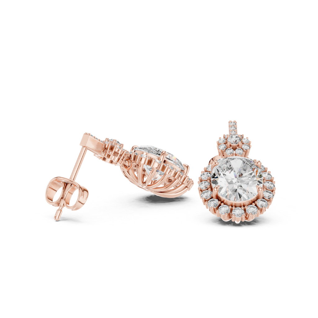 Rose gold earrings with clear Moissanite gemstones on a white background