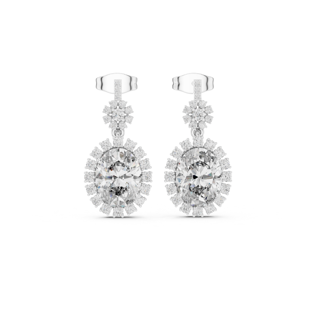 Pair of moissanite diamond earrings on a white background