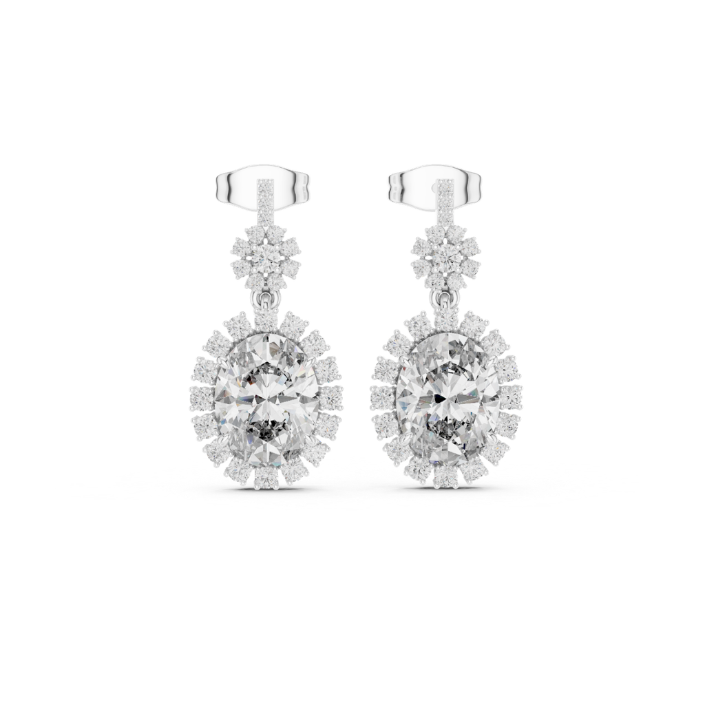 Pair of moissanite diamond earrings on a white background