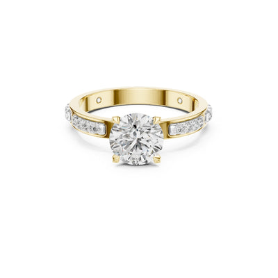 Gold ring with a Moissanite diamond on a white background