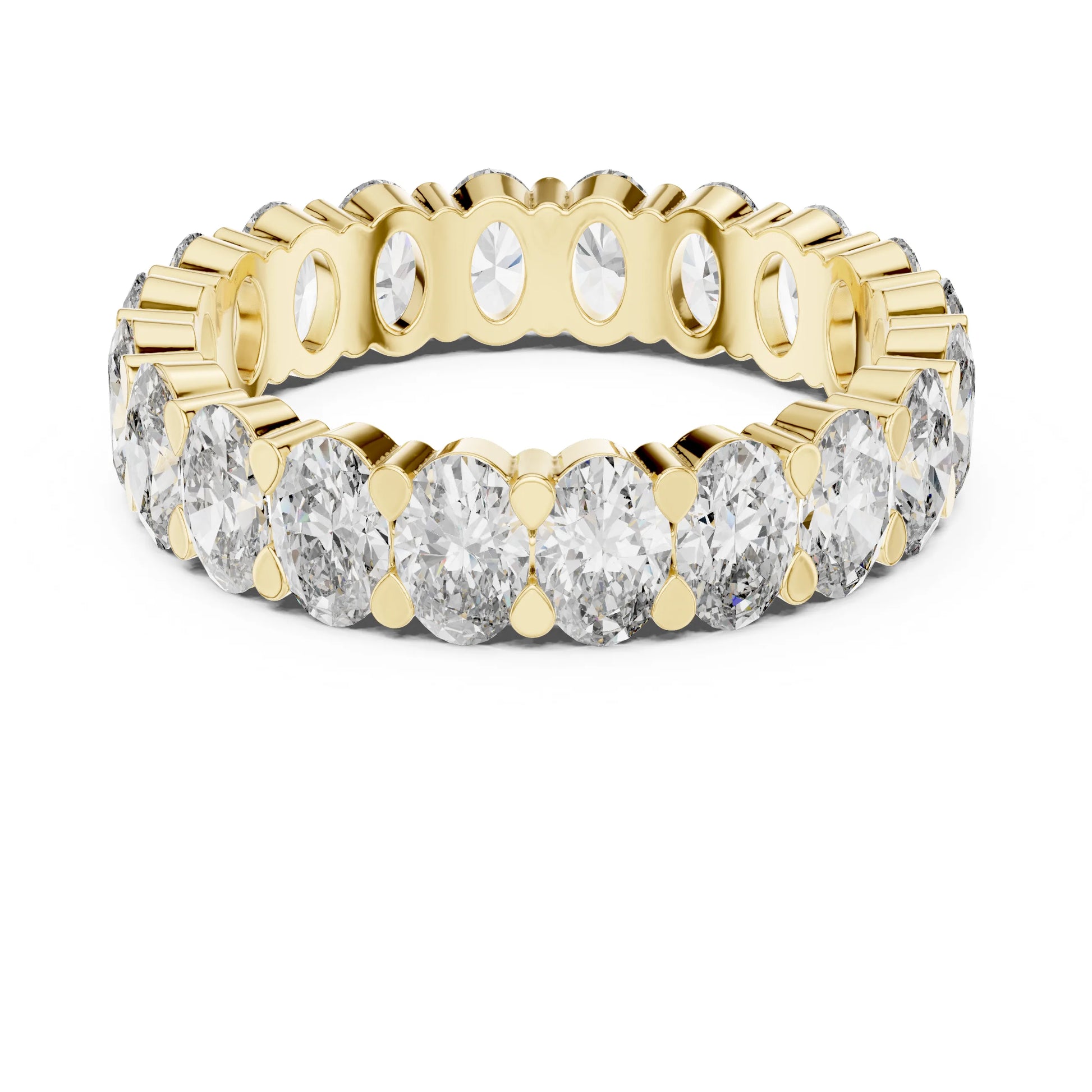 Gold ring with clear moissanite gemstones on a white background