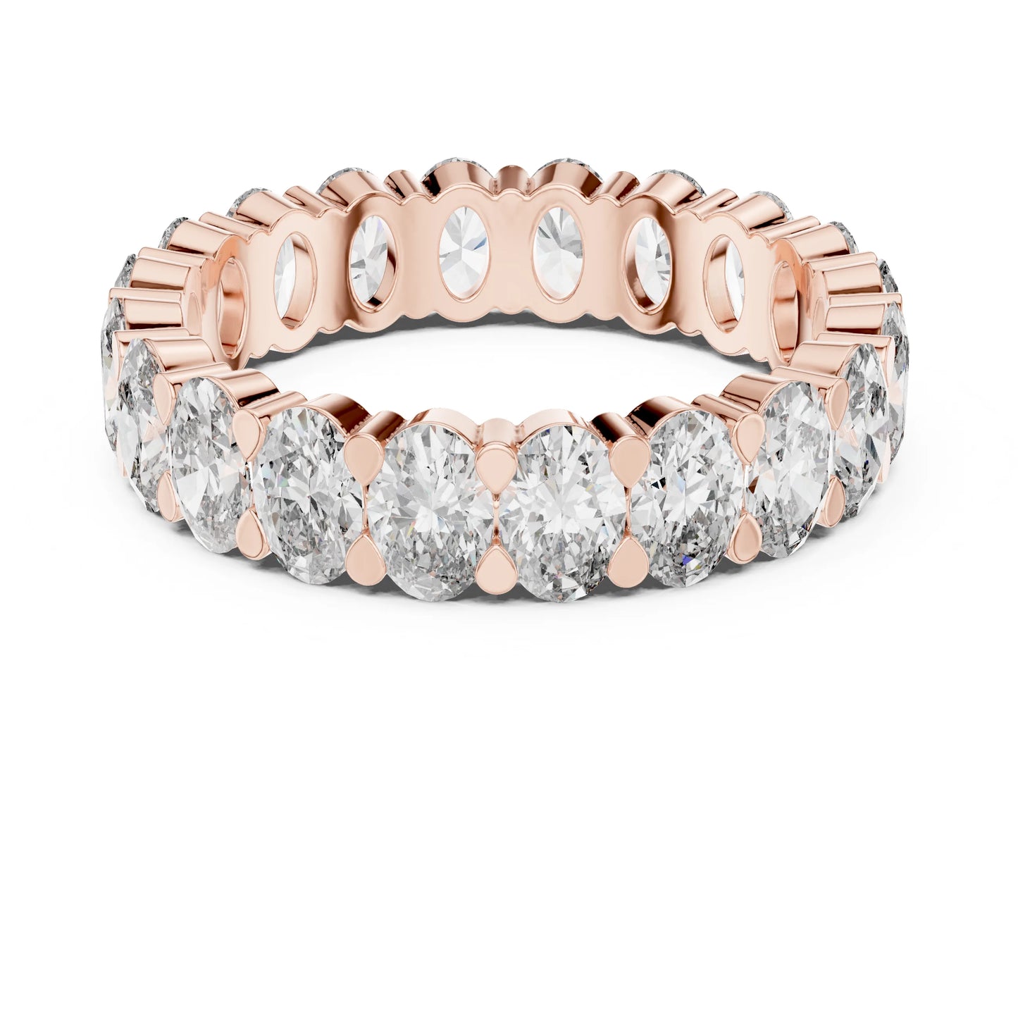 Rose gold and moissanite diamond ring on a white background