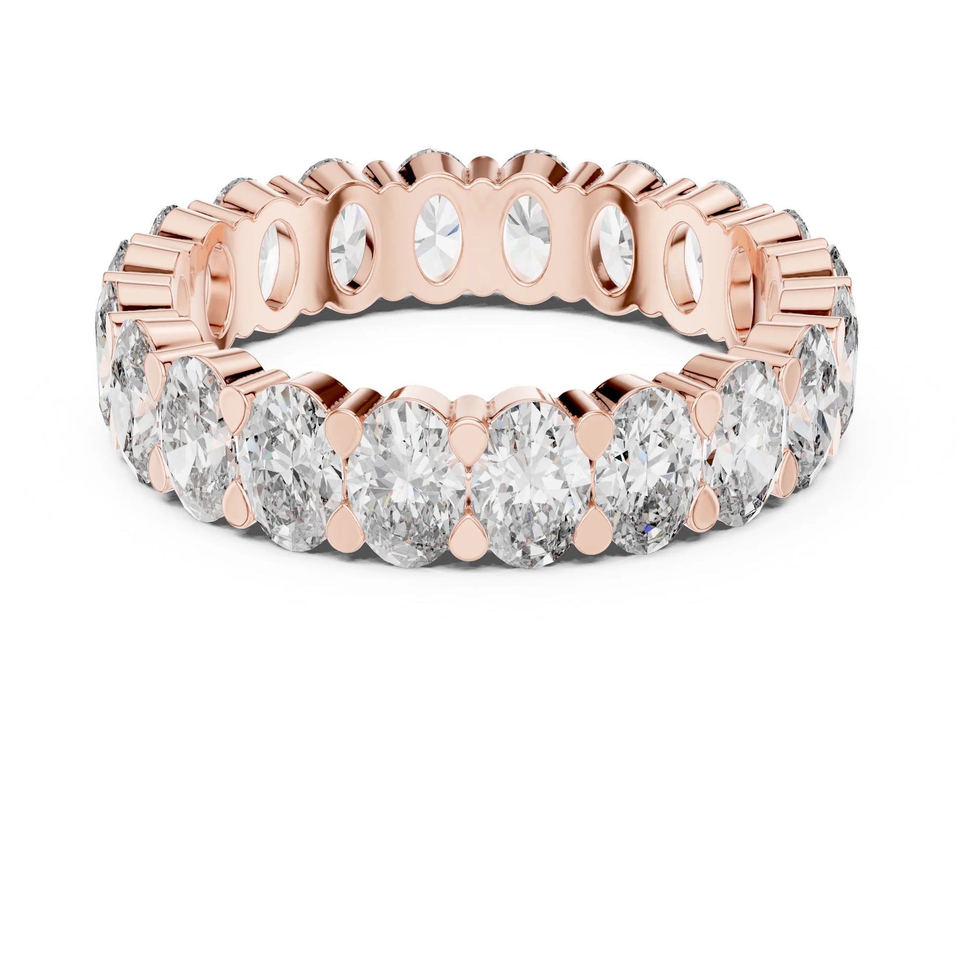 Rose gold and moissanite diamond ring on a white background