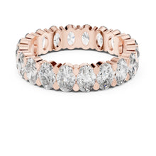 Load image into Gallery viewer, Rose gold ring with clear moissanite gemstones on a white background
