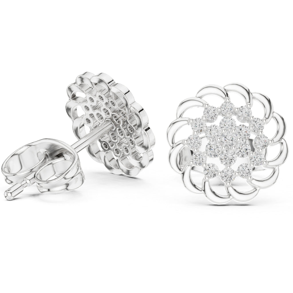 Silver floral earrings with clear moissanite  gemstones on a white background