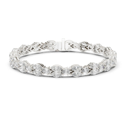 Silver bracelet with clear moissanite gemstones on a white background