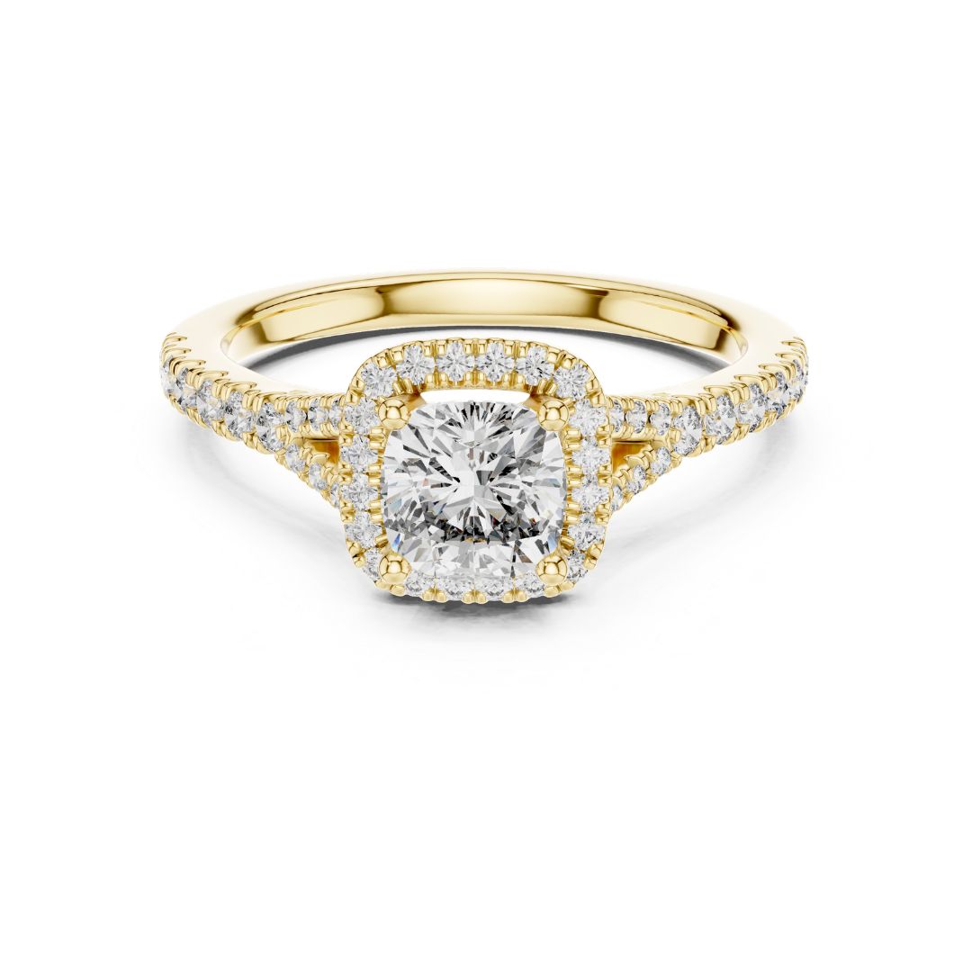 Gold ring with a moissanite diamond on a white background
