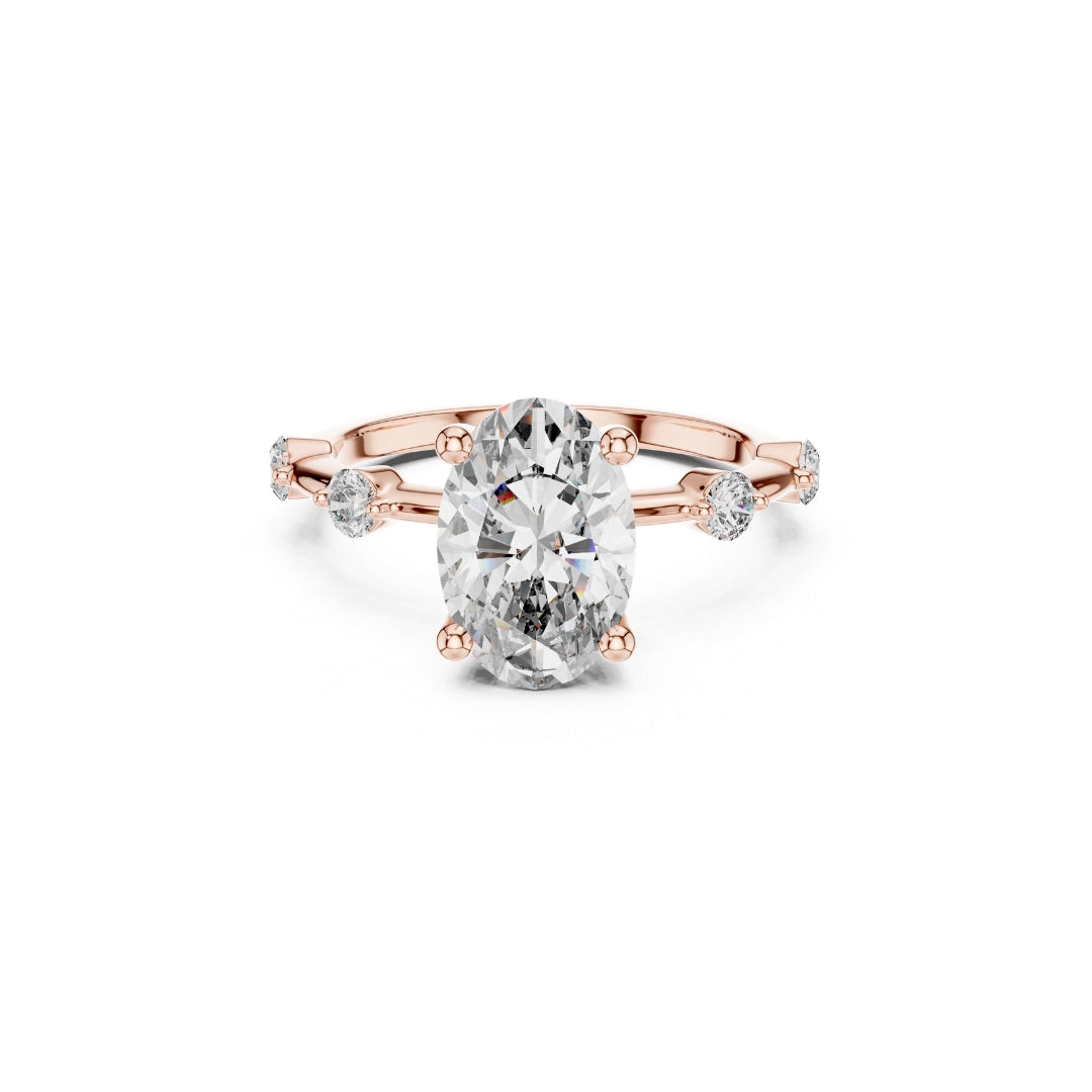 Rose gold ring with a 2CT OVAL MOISSANITE diamond and smaller diamonds on a white background
