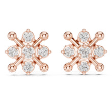 Load image into Gallery viewer, Rose gold earrings with clear Moissanite gemstones on a white background