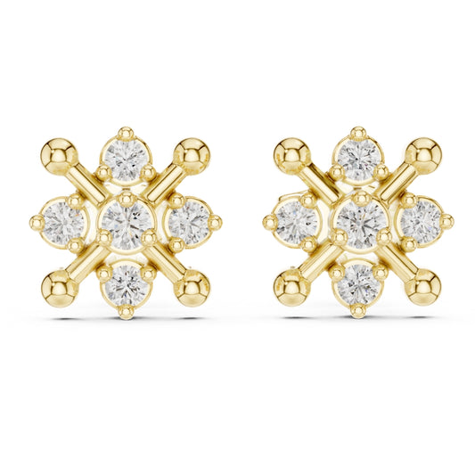 Gold finish and moissanite diamond earrings on a white background