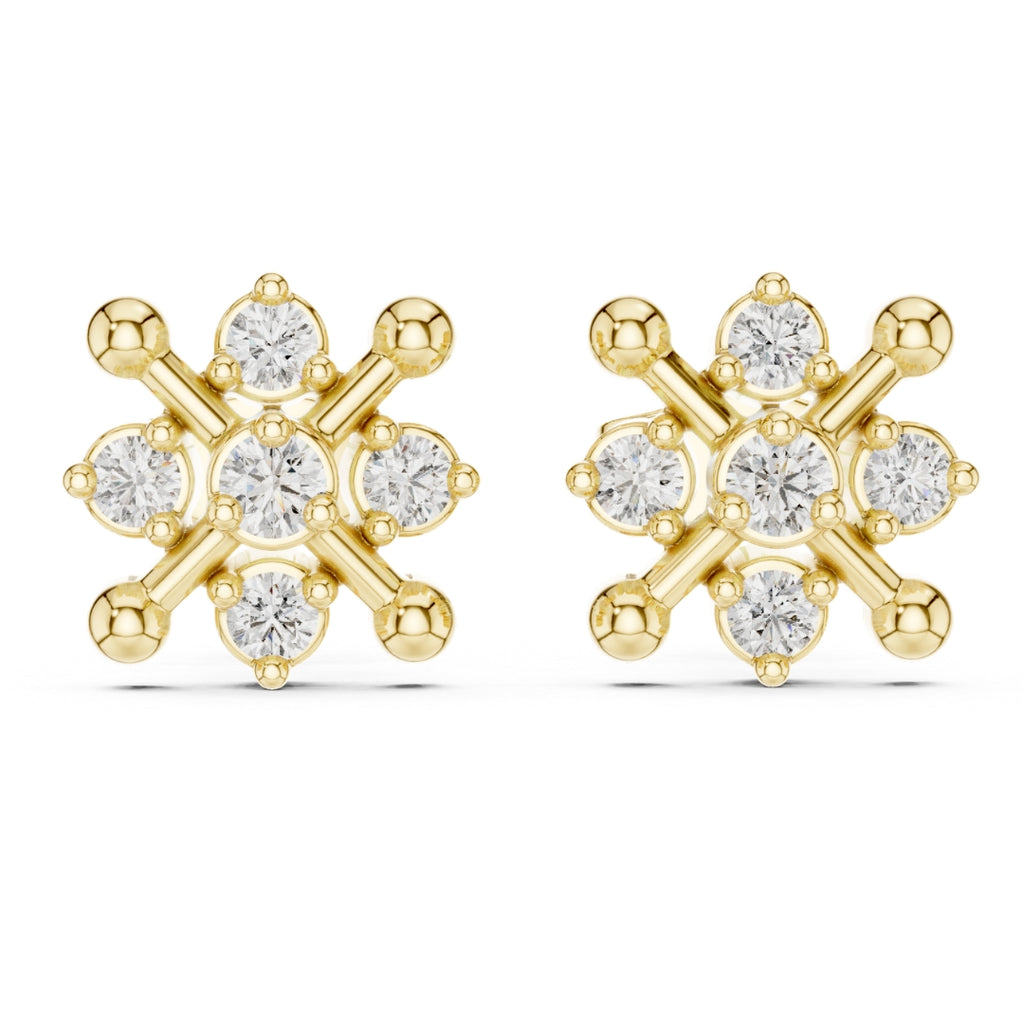 Gold finish and moissanite diamond earrings on a white background