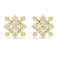 Load image into Gallery viewer, Gold finish and moissanite diamond earrings on a white background