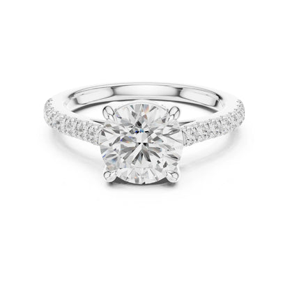 moissanite Diamond ring with a white gemstone on a white background