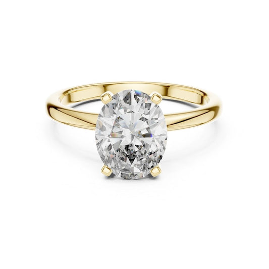 Gold ring with a large moissanite diamond on a white background