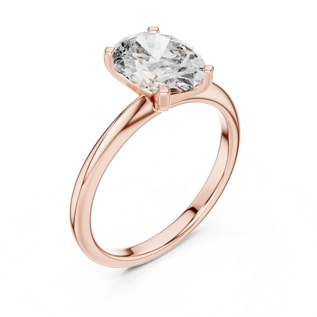 Rose gold ring with a large moissanite diamond on a white background