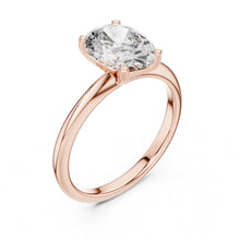 Load image into Gallery viewer, Rose gold ring with a large moissanite diamond on a white background