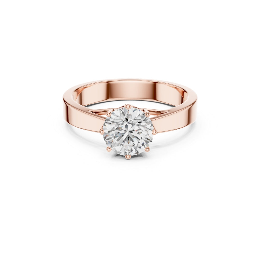 Rose gold ring with a 1ct moissanite diamond on a white background