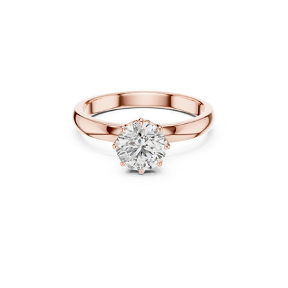 Rose gold ring with a 1ct moissanite diamond on a white background